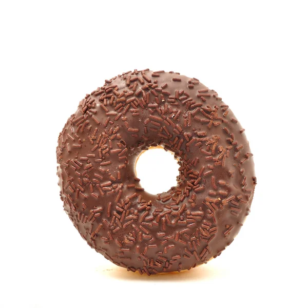 Köstliche süße Donuts auf weißem Hintergrund — Stockfoto