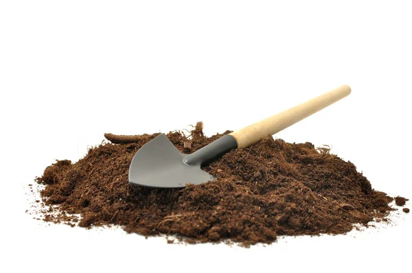 Gardening tools and peat on a white background — Stock Photo, Image