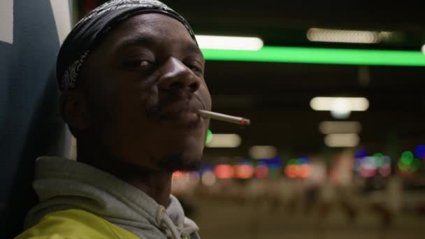 Portrait African American Teenager Looking Camera Smoking Cigarette Medicinal Cannabis — Vídeo de stock