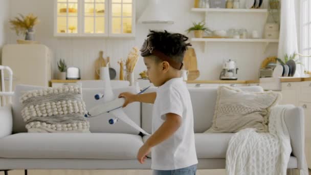 African American Child Aviapilot Glasses Holds Plane His Hands Circles — Wideo stockowe