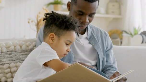 African American Father Curious Little Son Spend Weekend Together Sitting — Stockvideo