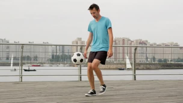 Caucasian Teenager Blue Shirt Black Shorts Football Freestyler Juggles Soccer — 图库视频影像