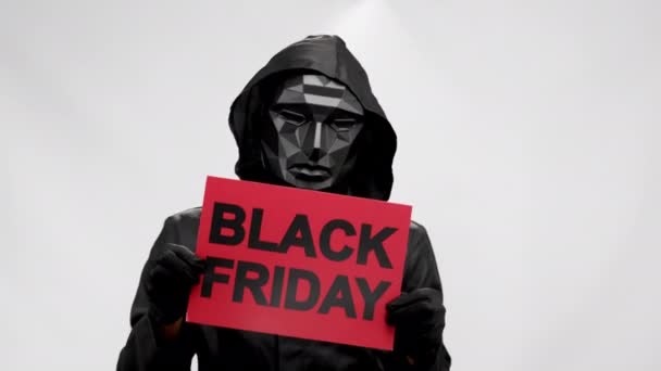 Energetic Anonymous Advertises Black Friday Showing Red Tablet Dancing Man — Stockvideo