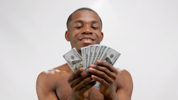 Cheerful Young African American Man Bare Torso Holds Dollar Bills — ストック動画