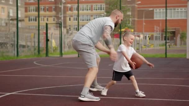 Father Plays Basketball Excited Son Empty Court Mature Hipster Bounces — Stockvideo