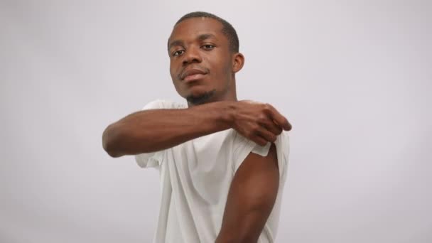Young Black Man Short Haircut Shows Patch Arm Demonstrating Health — Vídeo de stock