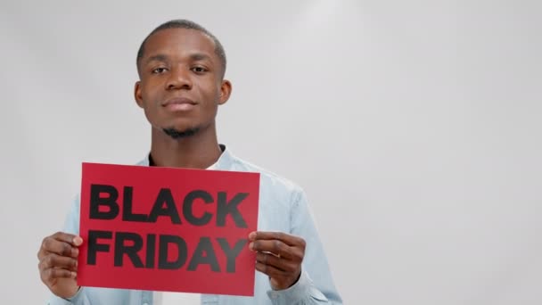 African American Man Denim Shirt Banner Black Friday Waves His — Vídeo de Stock