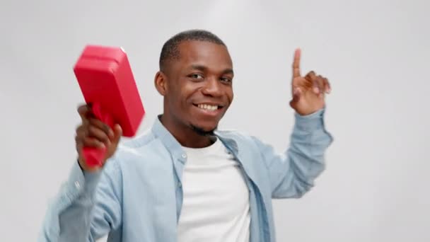 African American Man Shoots Dollars Plastic Gun Dancing Smiling White — Video