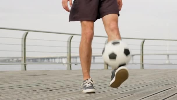 Professional Man Footballer Juggling Ball His Feet Waterfront Legs Closeup — Stock Video