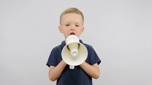 Portrait Little Child Boy Speaking His Speech Loudspeaker White Background — стоковое видео