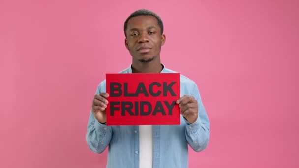 Happy African American Man Denim Shirt Raises Banner Inscription Black — Stock video
