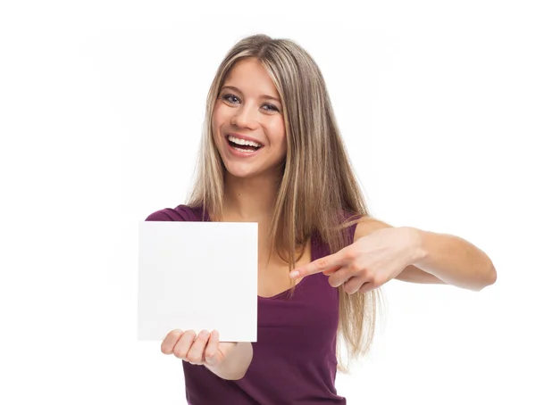 Beautiful woman showing blank white paper — Stock Photo, Image