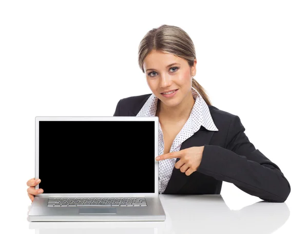 Business woman showing a laptop screen — Stock Photo, Image