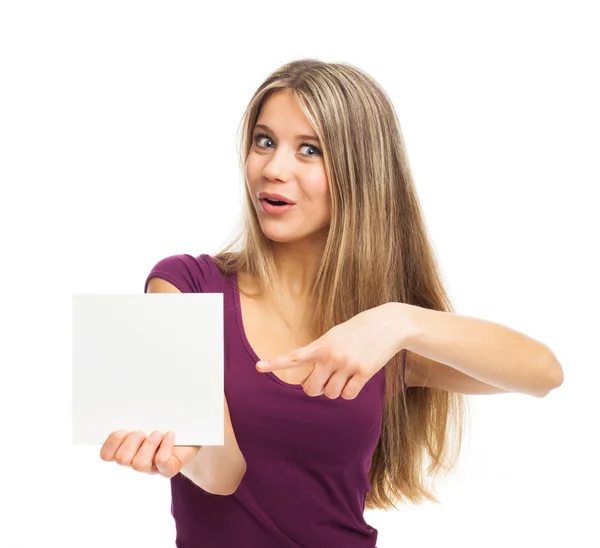 Young woman showing blank signboard with her finger — Stock Photo, Image