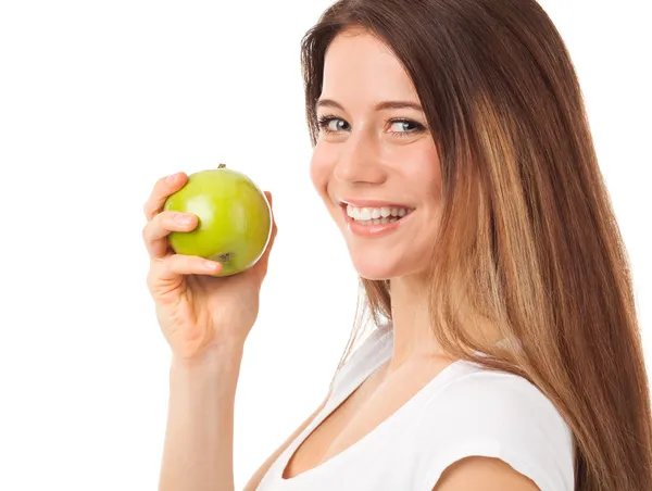 Hermosa mujer comiendo manzana verde — Foto de Stock