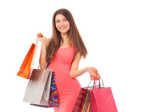 Atractiva joven mujer sosteniendo bolsas de compras — Foto de Stock