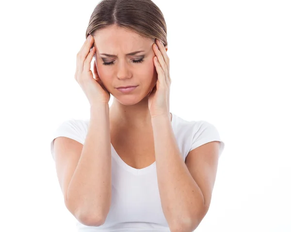 Женщина, имеющая Headache — стоковое фото