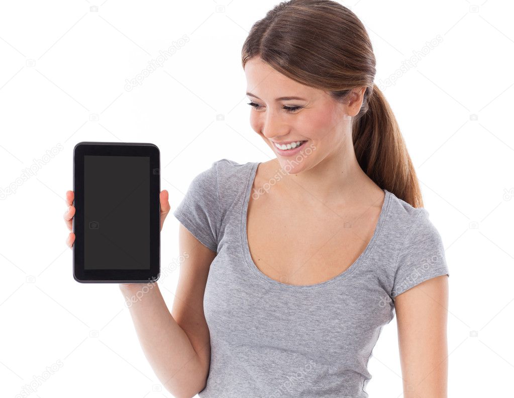 Young woman showing tablet pc