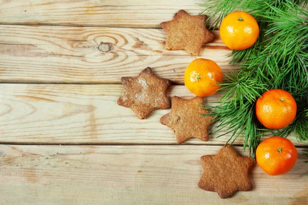Mandarinen Kerzen Lichter Sterne Auf Einem Hölzernen Hintergrund Weihnachten Lebkuchen — Stockfoto