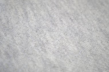 Örgü yün kumaşın ayrıntıları. Tekstil arka planı. Yünlü doku arka planı, örgü yün kumaş, tüylü yumuşacık tekstil. Yakın çekim.