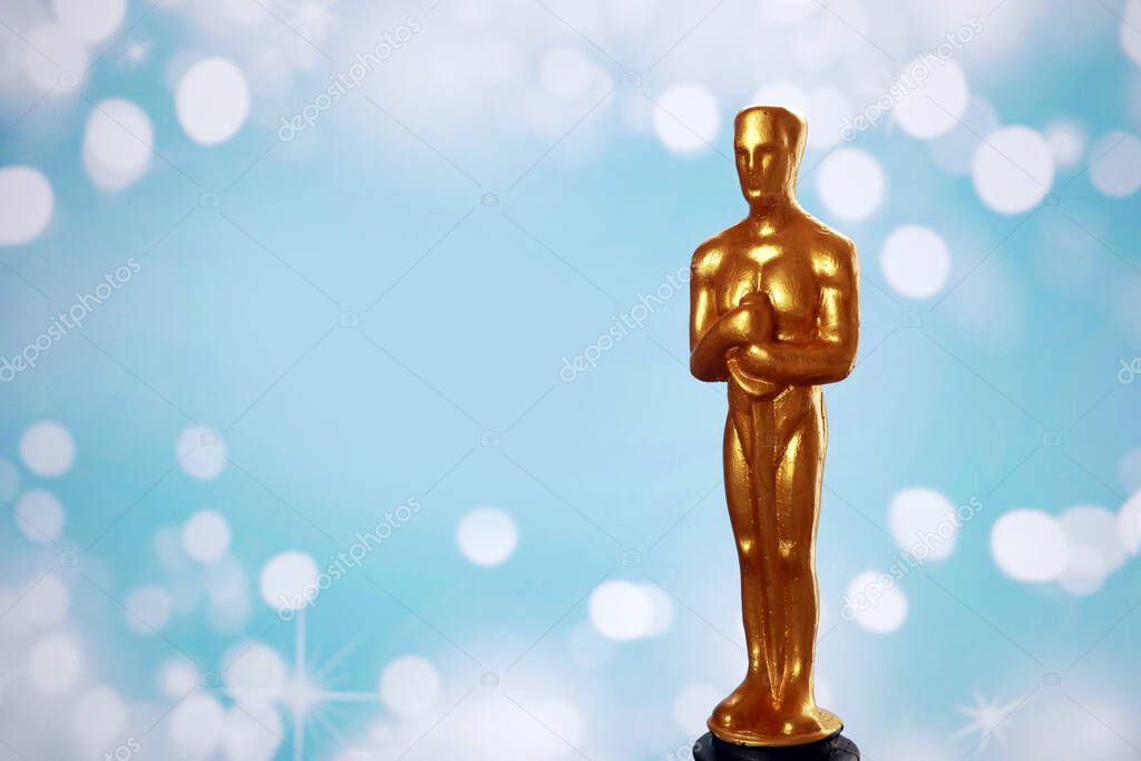 Hollywood Golden Oscar Academy award statue. Success and victory concept., closeup