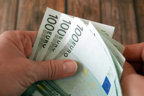 Hand Holding Big Stack Euro Money Wooden Background Money Cash — Fotografia de Stock