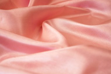 Açık pembe kumaş dokusu, ipek arkaplan, yüzey, yakın plan