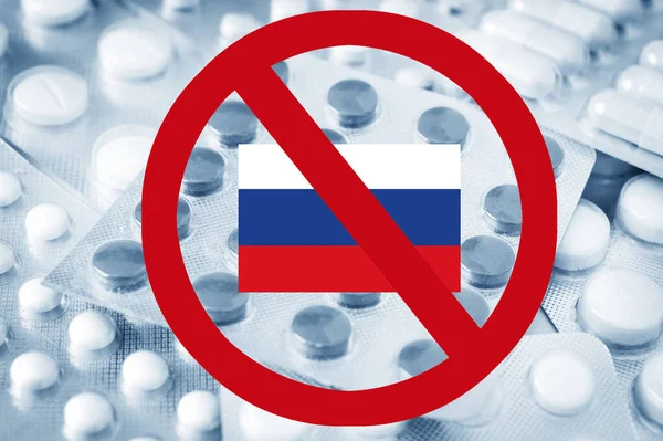 many pills and drugs and and red forbidding sign with Russia flag. Ban of European medicines delivery, foreign pharmaceutical companies leave the Russian market concept, symbol