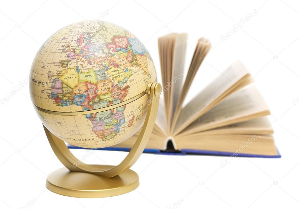 Globe and book on white background