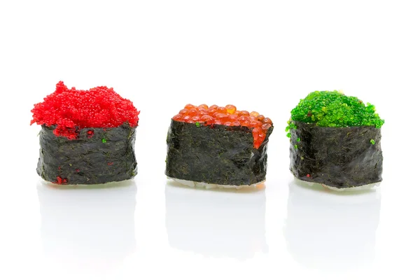 Japansk sushi på en vit bakgrund med reflektion — Stockfoto