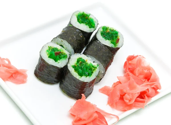 Sushi med Gravad lax och ingefära på en vit bakgrund — Stockfoto
