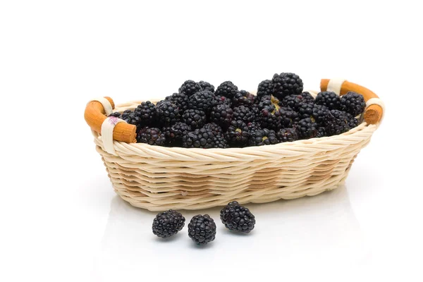 Blackberries in a basket on a white background. horizontal photo — Stock Photo, Image