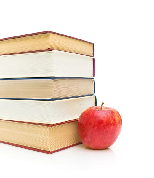 Books and apple isolated on white background — Stock Photo, Image