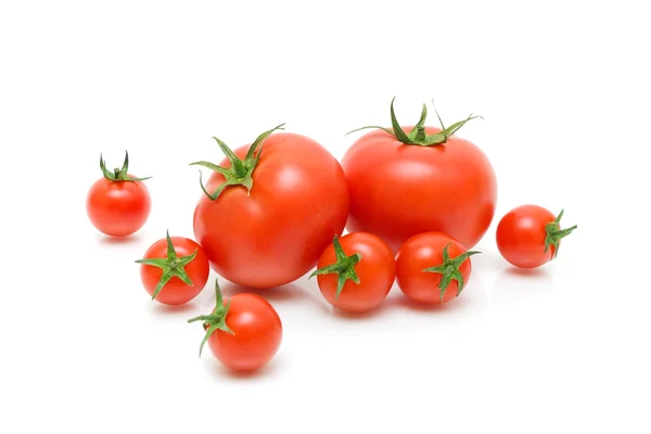 Tomates sobre fondo blanco de cerca — Foto de Stock