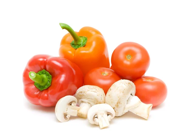 Setas y verduras sobre un fondo blanco de cerca — Foto de Stock