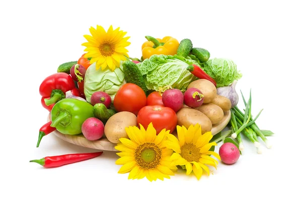 Vegetables and sunflowers on a white background — Stock Photo, Image