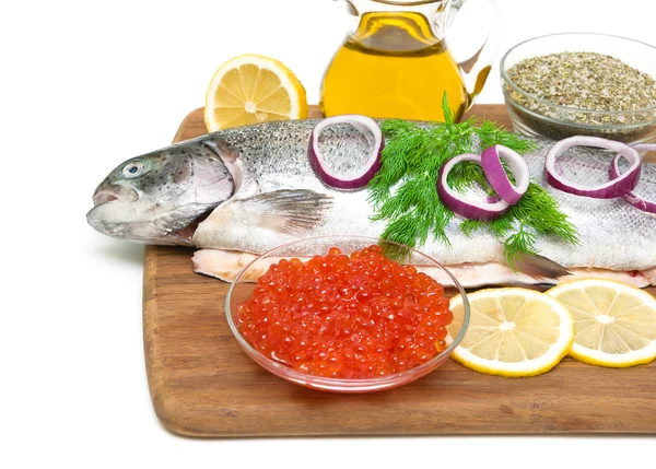 Red caviar and fresh trout on a cutting board — Stock Photo, Image