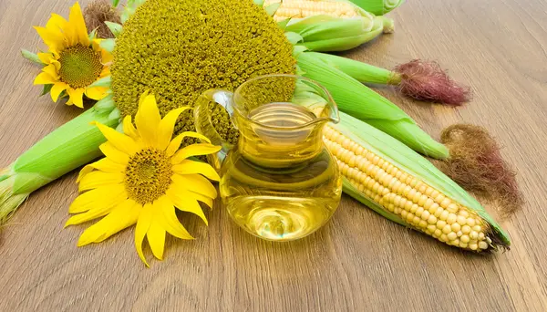 Sunflowers, corn and oil closeup — Stock Photo, Image