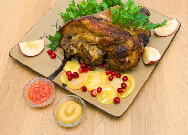 Appetizing baked pork knuckle close-up. top view - horizontal ph — Stock Photo, Image