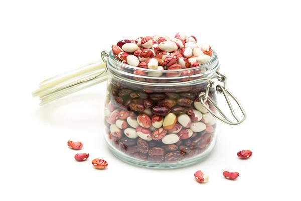 Beans in a glass jar on a white background — Stock Photo, Image