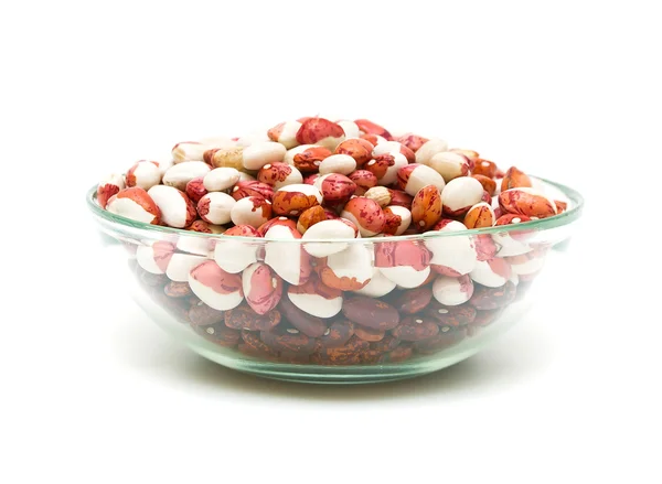 Beans in a glass bowl on a white background — Stock Photo, Image