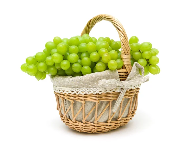 Bunch of grapes in a basket isolated on a white background — Stock Photo, Image