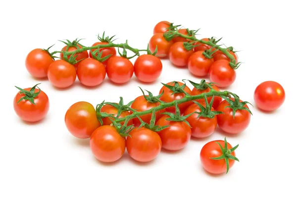 Dojrzałe pomidory na białym tle na białe tło zbliżenie — Zdjęcie stockowe