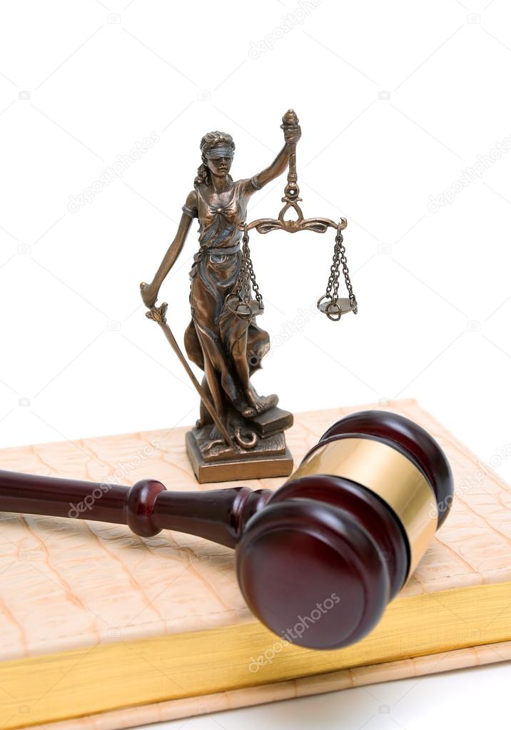 statue of justice, gavel and book on white background