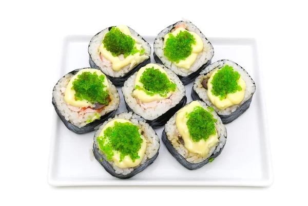 Sushi på en tallrik som isolerad på vit bakgrund — Stockfoto