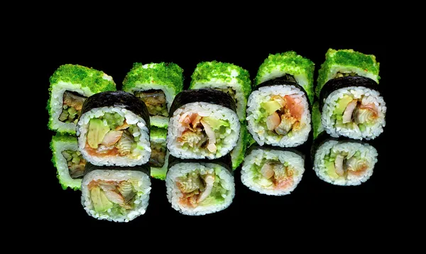 Japanese rolls close-up on black background with reflection — Stock Photo, Image