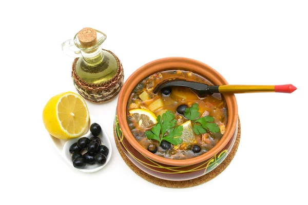 Thistle soup, olives, lemon and sunflower oil on a white backgro — Stock Photo, Image