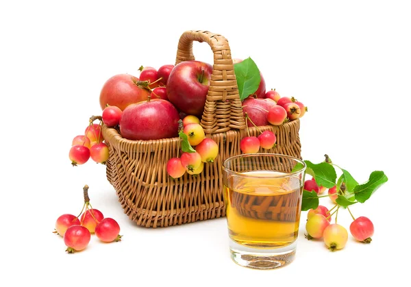 Ripe apples in a basket on a white background — Stock Photo, Image