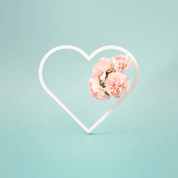 Pastel Blue Background Heart Shaped Frame Artificial Flowers Valentine Day — Stok Foto