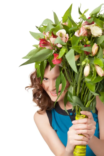 Portrait of pretty brunette holding bouquet of flowers — Stock Photo, Image